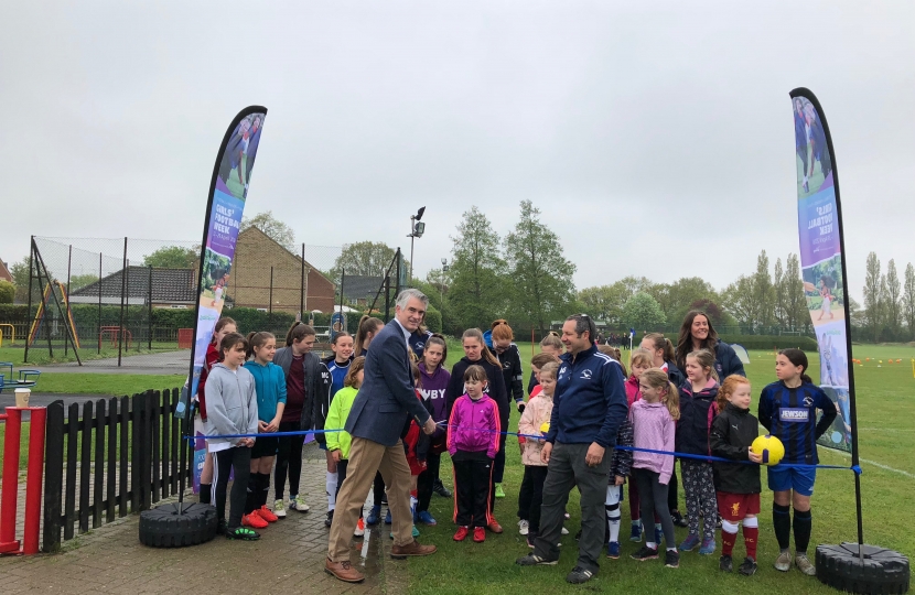 James Cartlidge MP cutting Wildcats ribbon