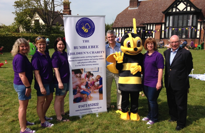 James with volunteers and patrons